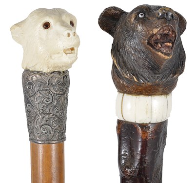 Lot 390 - A SILVER-MOUNTED AND CARVED IVORY TOPPED WALKING STICK