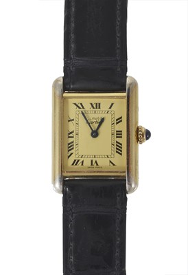 Lot 440 - CARTIER, TANK: A LADY'S SILVER-GILT WRISTWATCH