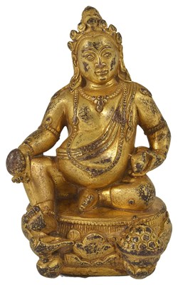 Lot 13 - A GILT-BRONZE FIGURE OF KUBERA