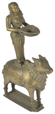 Lot 25 - A BRONZE FIGURE OF DIPALAKSHMI ON NANDI