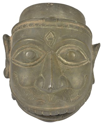 Lot 31 - A BRONZE FINIAL IN THE FORM OF A HEAD OF HANUMAN