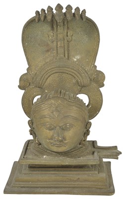 Lot 32 - A BRONZE SIVA LINGAM