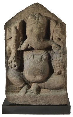 Lot 58 - A PINK SANDSTONE STELE DEPICTING GANESHA