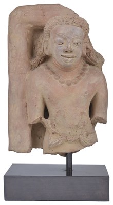 Lot 59 - A GUPTA TERRACOTTA RELIEF FRAGMENT DEPICTING A MALE FIGURE