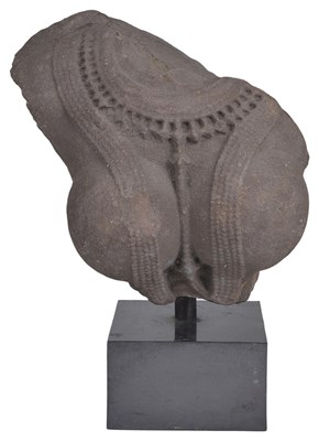 Lot 64 - A PINK SANDSTONE FEMALE TORSO