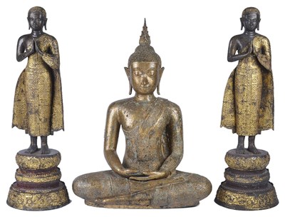 Lot 67 - A LACQUERED GILT BRONZE FIGURE OF BUDDHA WITH TWO ASSOCIATED FIGURES OF DEVOTEES