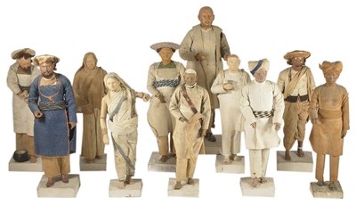 Lot 117 - ELEVEN LARGE CLAY FIGURES OF INDIAN CHARACTERS