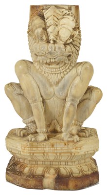 Lot 122 - ~AN IVORY FIGURE OF A MYTHICAL LION