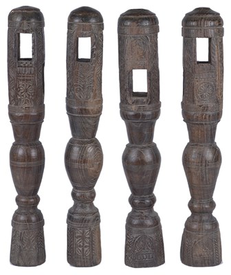 Lot 183 - FOUR CHARPOY LEGS