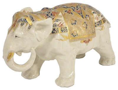 Lot 285 - A JAPANESE SATSUMA FIGURE OF AN ELEPHANT