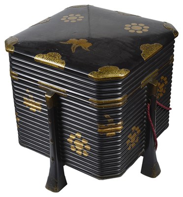 Lot 310 - A JAPANESE GOLD AND BLACK LACQUER KARABITSU (STORAGE CHEST)