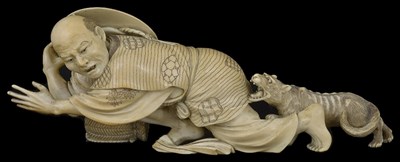 Lot 329 - ~A JAPANESE IVORY OKIMONO OF A FARMER