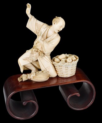 Lot 339 - ~A JAPANESE IVORY OKIMONO OF A FARMER