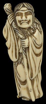 Lot 347 - ~A JAPANESE IVORY NETSUKE OF TEKKAI SENNIN