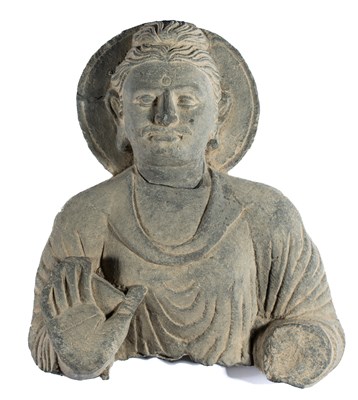 Lot 102 - A GANDHARA GREY SCHIST BUST OF BUDDHA, NORTH-WESTERN PAKISTAN, 3RD/4TH CENTURY