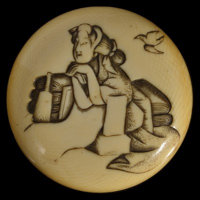 Lot 355 - ~A JAPANESE TWO-PART IVORY MANJU NETSUKE