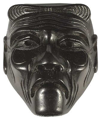 Lot 367 - ~A JAPANESE EBONY MASK NETSUKE OF SANKOJO