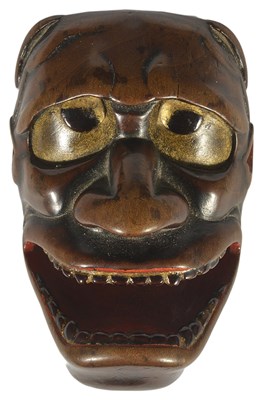 Lot 371 - A JAPANESE PARTLY LACQUERED WOOD MASK NETSUKE OF NAMANARI