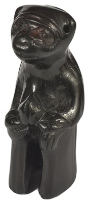 Lot 390 - ~A JAPANESE EBONY NETSUKE OF A MONKEY