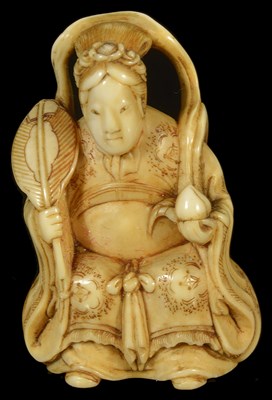 Lot 398 - ~A JAPANESE IVORY NETSUKE OF SEIOBO