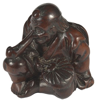 Lot 423 - A JAPANESE PLUM WOOD NETSUKE OF SOJOBO