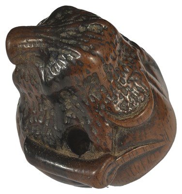 Lot 424 - A JAPANESE PERSIMMON WOOD NETSUKE OF AN OVERRIPE FIG