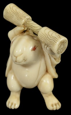 Lot 432 - ~A JAPANESE IVORY NETSUKE OF THE LUNAR HARE