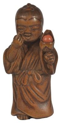 Lot 436 - A JAPANESE BOXWOOD NETSUKE OF A BOY DOING BEKKAKO