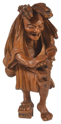 Lot 440 - A JAPANESE WOOD NETSUKE OF ABURA BOZU