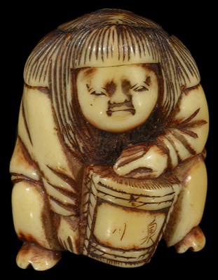 Lot 447 - A JAPANESE STAG ANTLER NETSUKE OF A SHOJO