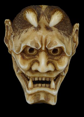 Lot 459 - ~A JAPANESE IVORY MASK NETSUKE OF HANNYA