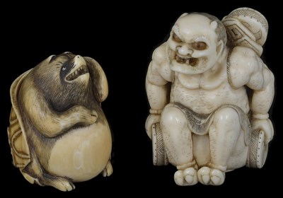 Lot 463 - ~A JAPANESE IVORY NETSUKE OF RAIDEN (THE THUNDER GOD)