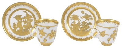 Lot 485 - TWO MEISSEN CUPS AND SAUCERS WITH AUGSBURG GILT DECORATION