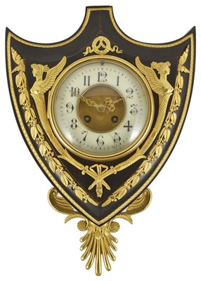 Lot 504 - AN EMPIRE STYLE BRONZE WALL CLOCK