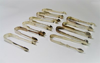 Lot 544 - A COLLECTION OF TEN SILVER SUGAR TONGS