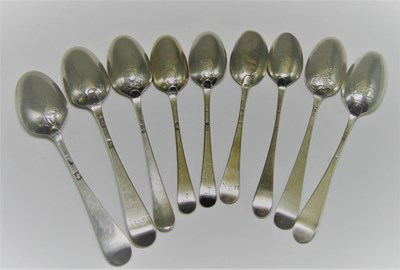 Lot 546 - A COLLECTION OF NINE SILVER FANCY-BACK TEASPOONS