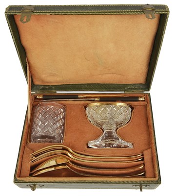 Lot 552 - A FRENCH SILVER-GILT TRAVELLING CANTEEN