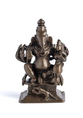 Lot 140 - A BRONZE FIGURE OF GANESHA, TAMIL NADU, SOUTH INDIA, CIRCA 17TH CENTURY