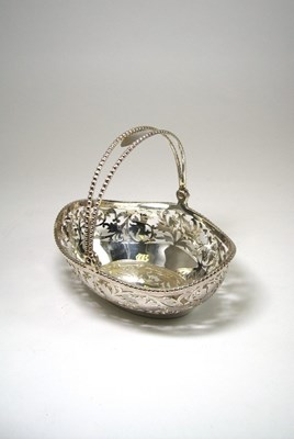 Lot 600 - A SILVER SWEETMEAT BASKET