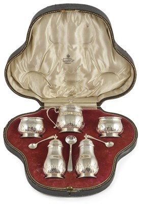 Lot 609 - A GEORGE V SILVER FIVE-PIECE CONDIMENT SET