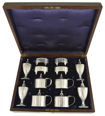 Lot 613 - A GEORGE V SILVER TWELVE-PIECE CONDIMENT SET