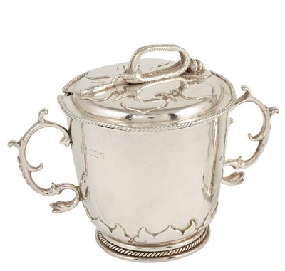 Lot 618 - A GEORGE V SILVER TWO-HANDLED PORRINGER AND COVER