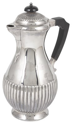 Lot 623 - A VICTORIAN SILVER HOT WATER JUG