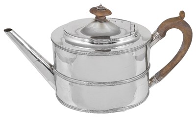 Lot 670 - A GEORGE III SILVER TEAPOT