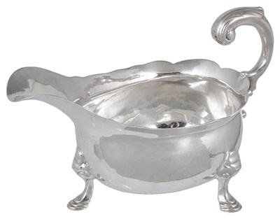 Lot 680 - A GEORGE II SILVER SAUCEBOAT