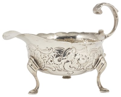 Lot 686 - A GEORGE II SILVER CREAM BOAT