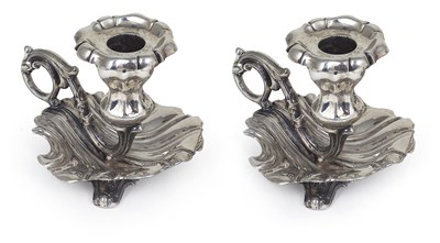 Lot 74 - A PAIR OF SWEDISH SILVER CHAMBERSTICKS