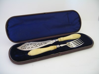 Lot 97 - A PAIR OF VICTORIAN ELECTROPLATE AND IVORY FISH SERVERS