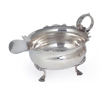 Lot 112 - A GEORGE III SILVER CREAM BOAT