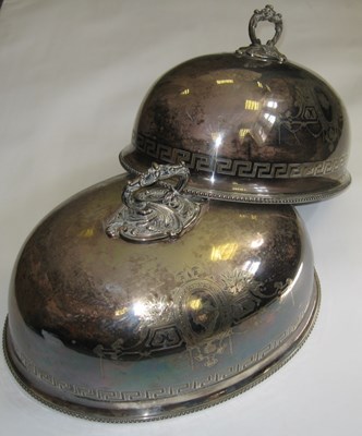 Lot 128 - A PAIR OF VICTORIAN ELECTROPLATE MEAT DISH COVERS